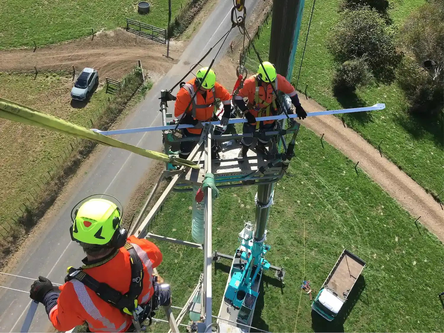 Westpower powerlines team installing and maintaining powerlines